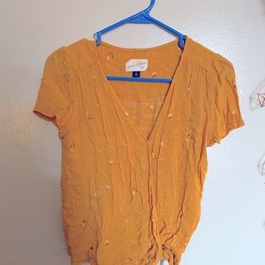 Short sleeve wrap blouse.